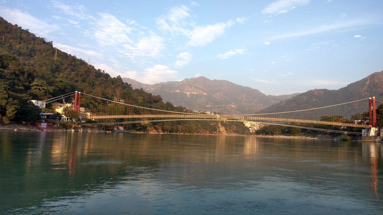 Lakshman Jhula suspension bridge across the Ganges, seen from a boat